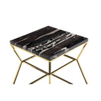 Table d'appoint Lio 45 cm, plateau en marbre noir, structure dorée en forme de sablier ouvert